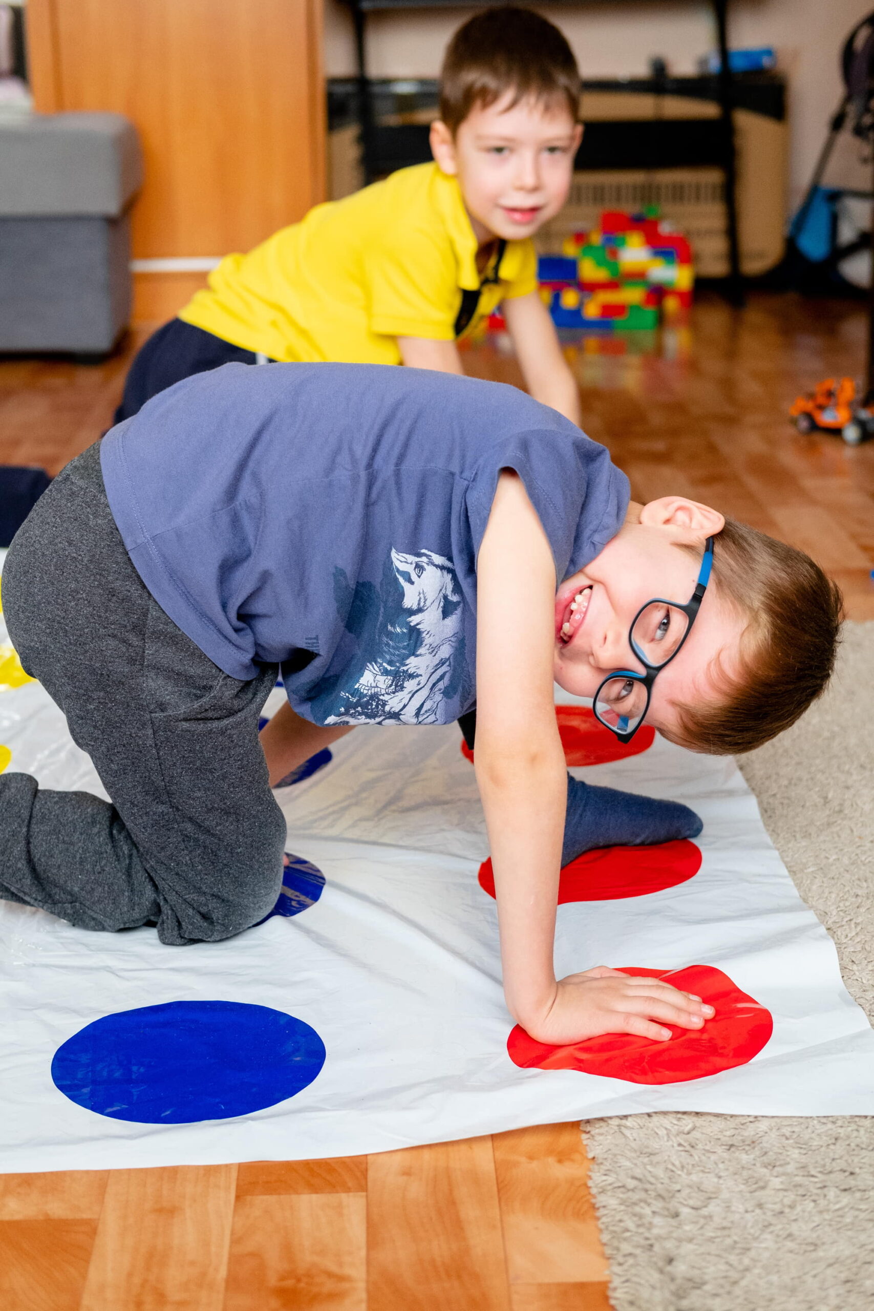 children-play-twister-at-home-funny-and-active-ga-2025-03-08-03-25-41-utc
